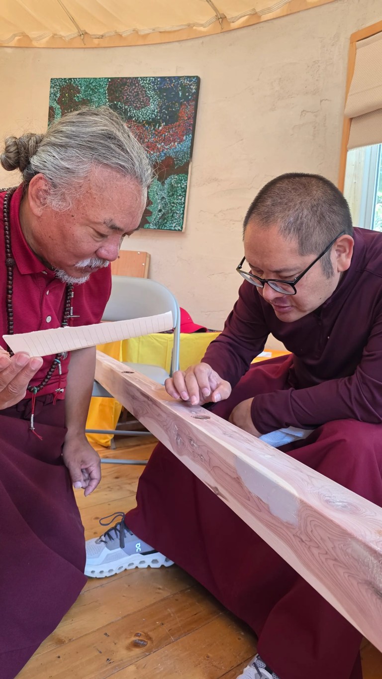 Adzom Gyalse Rinpoche conducting the Stupa contents Blessing ceremony with his Sangha
